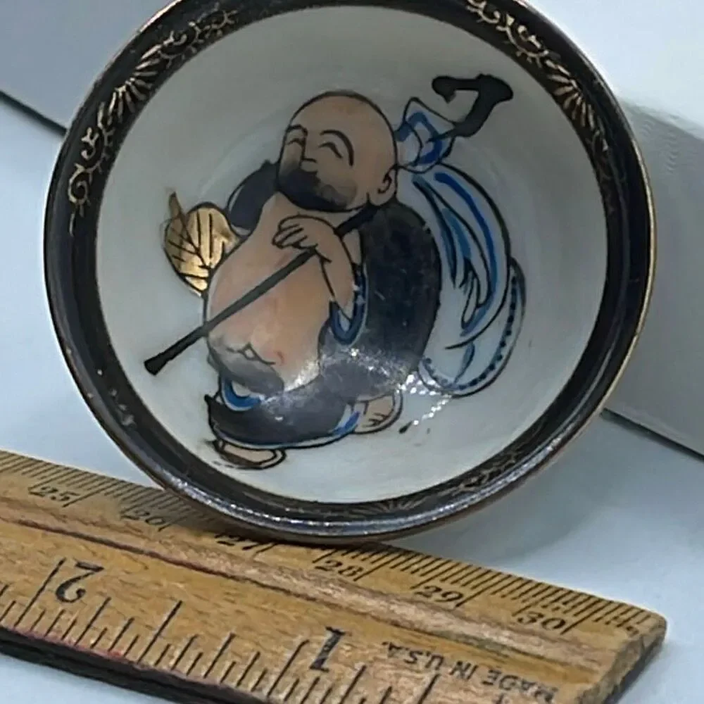 Vintage Japanese Kutani ware sake cup hand painted Lucky God.